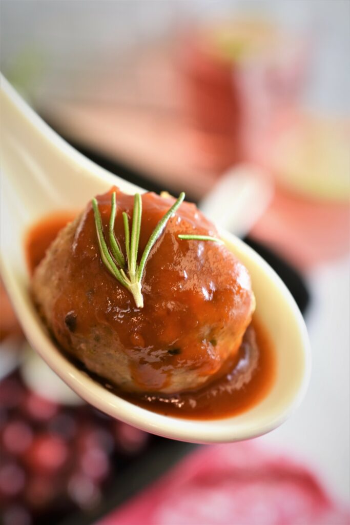 up close turkey bite in a spoon with rosemary