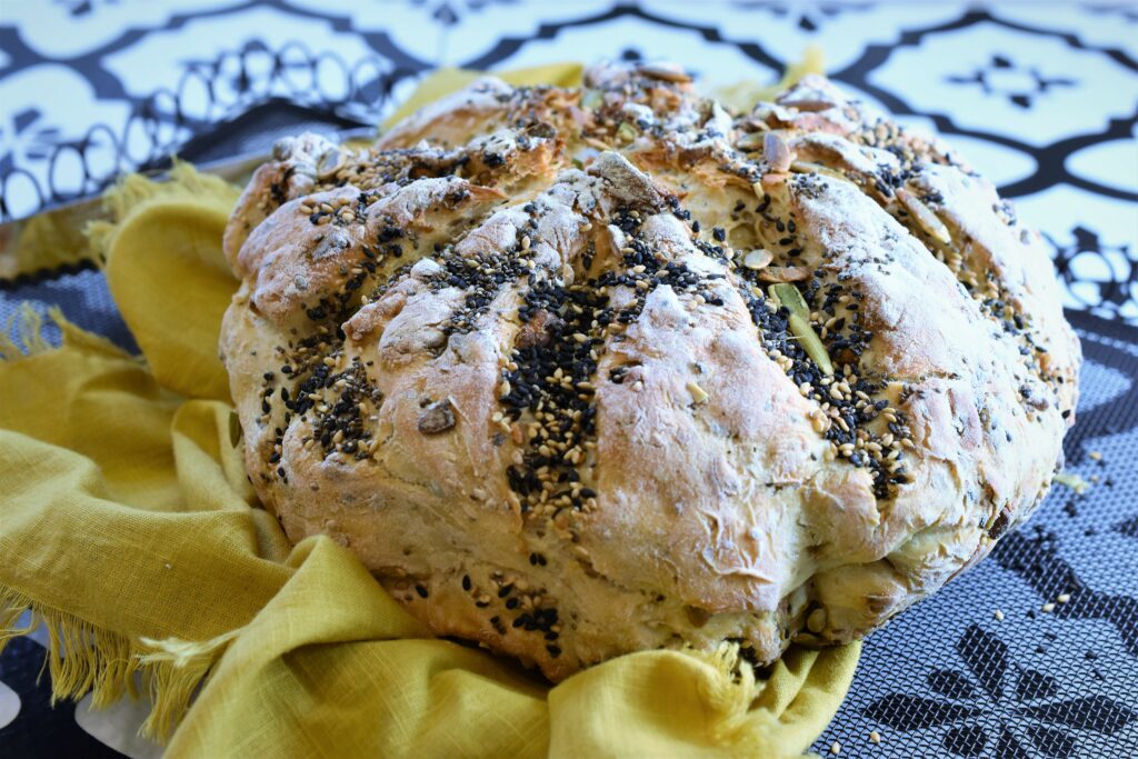 No-Knead 4 Seed Dutch Oven Bread - Nourish and Fete