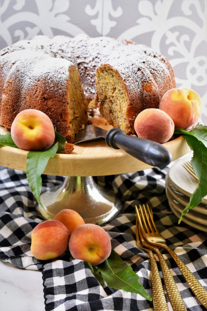 pieces of bundt cake cut out of a whole bundt cake ready to be served