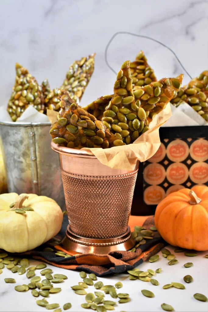 3 mini metal containers with homemade Halloween treats