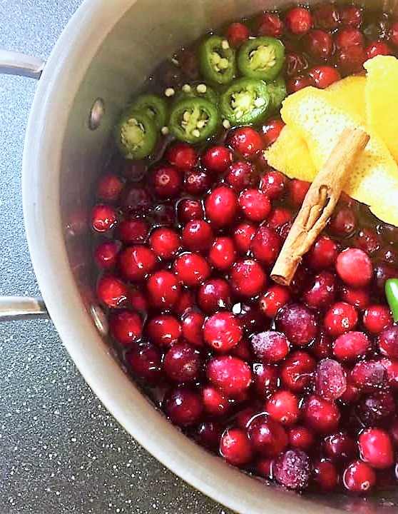 cooking fresh chili infused cranberry vinegar