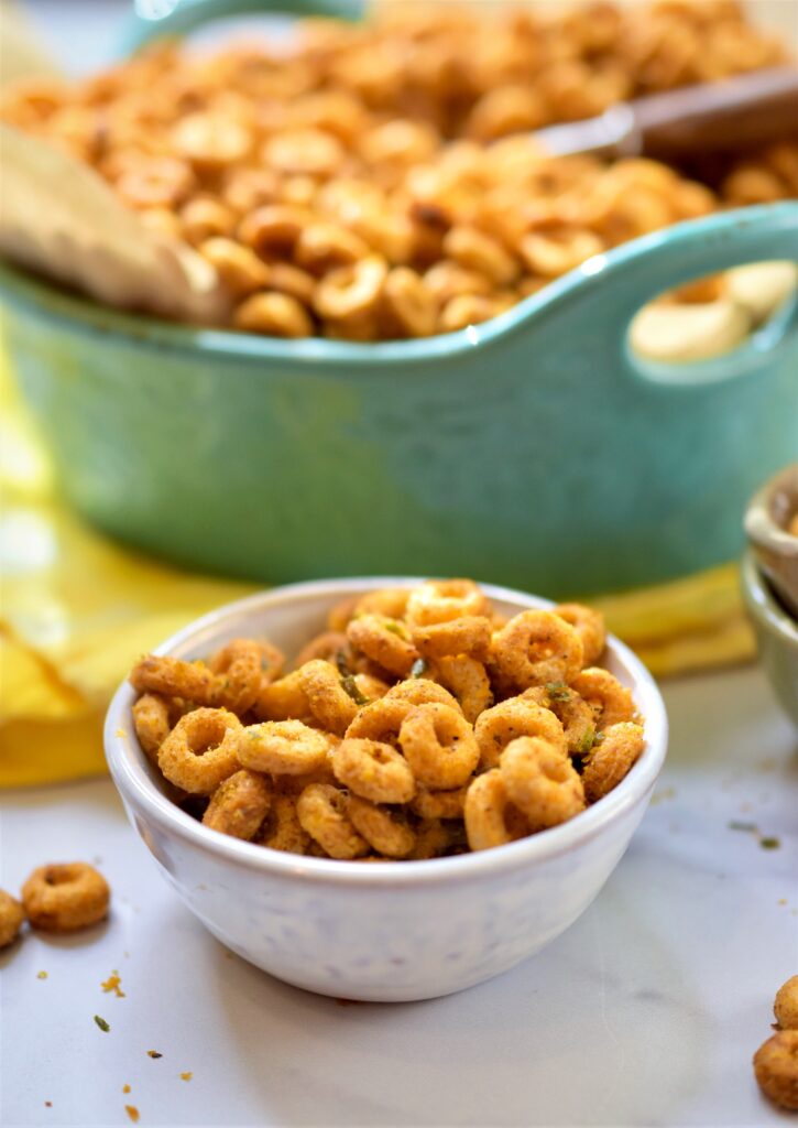 up close view of cereal snack mix in mini white bowl